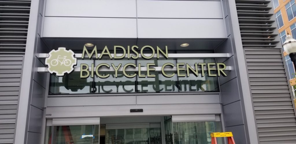 A photo of the Madison Bike Center's front sign.
